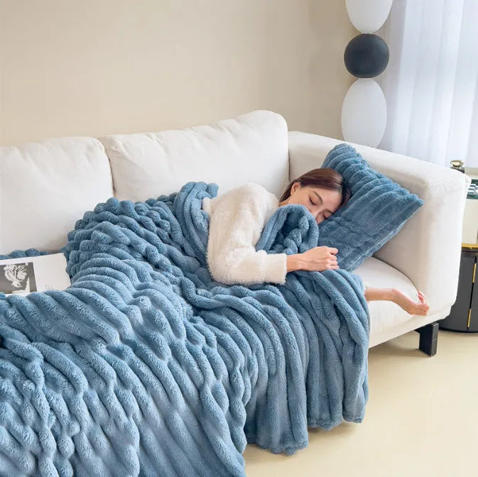 Double-sided bubble velvet faux rabbit fur blanket in a solid colour, shown folded.
