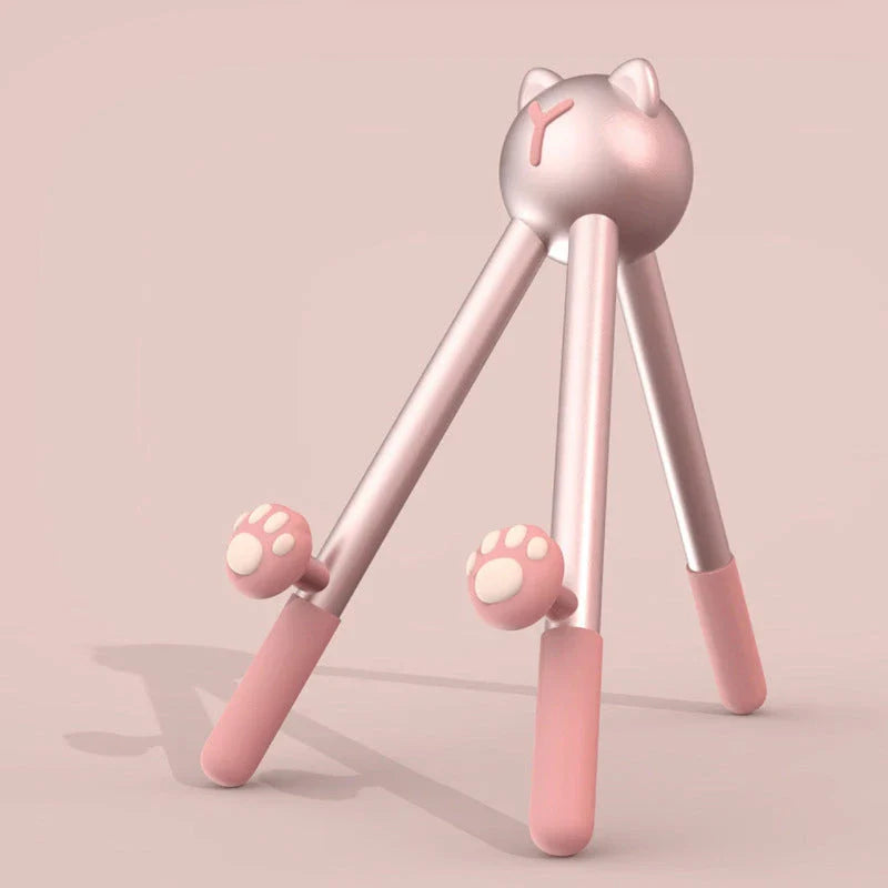 Adjustable desk stand in pink and green alien-inspired designs, featuring a mobile phone and tablet holder with 120-degree angle adjustment