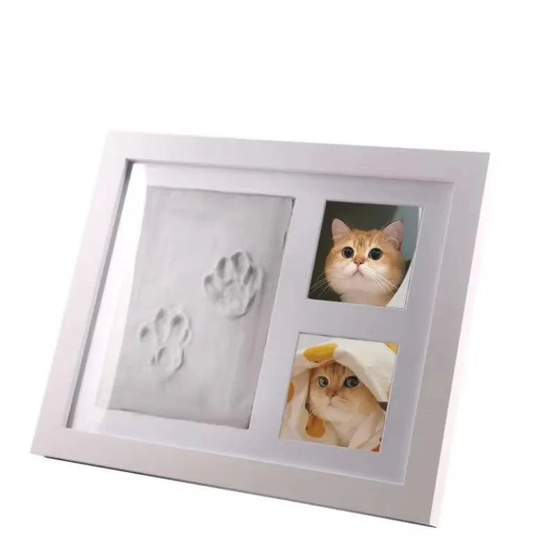 Pet memorial photo frame for cats and dogs, designed for DIY hand and foot print keepsakes with mouldable mud material, black or white colour options to preserve paw prints and create personalised commemorative displays in your home.