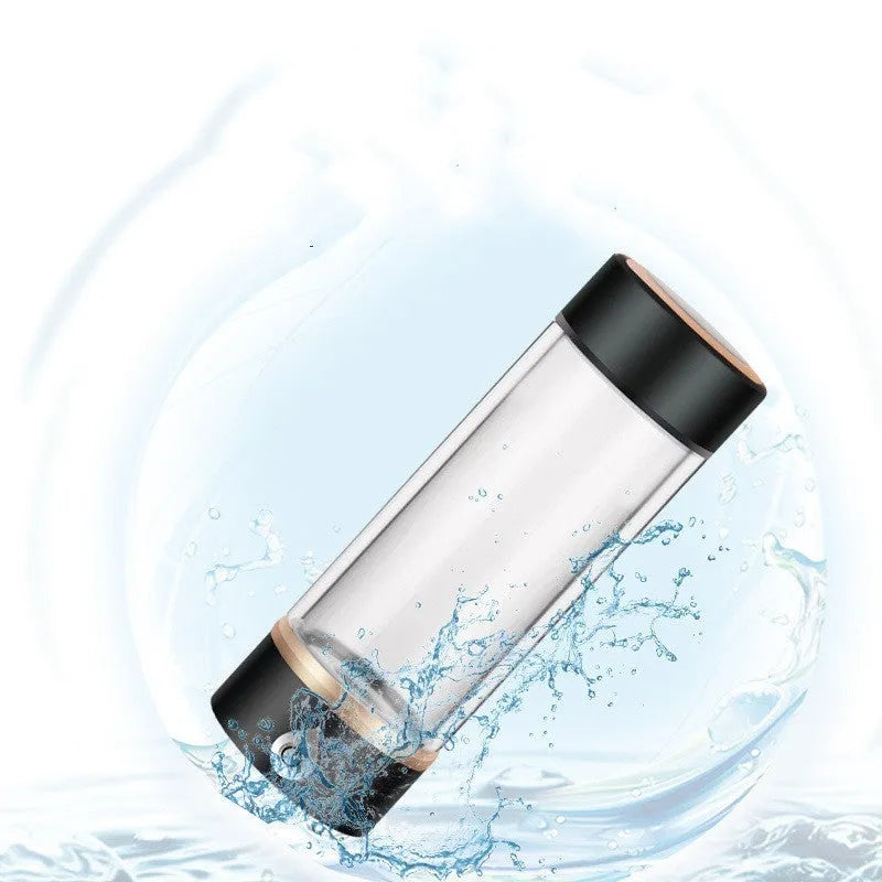 Portable hydrogen water ionizer bottle with high borosilicate glass cup in silver finish.