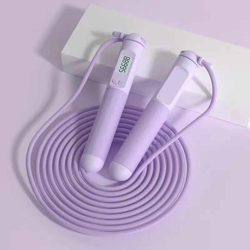 Skipping rope with bearings in various colours like black long shoelace or green cordless, made from ABS plastic for fitness use.