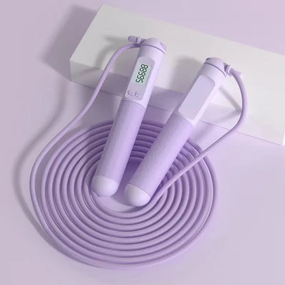 Skipping rope with bearings in various colours like black long shoelace or green cordless, made from ABS plastic for fitness use.