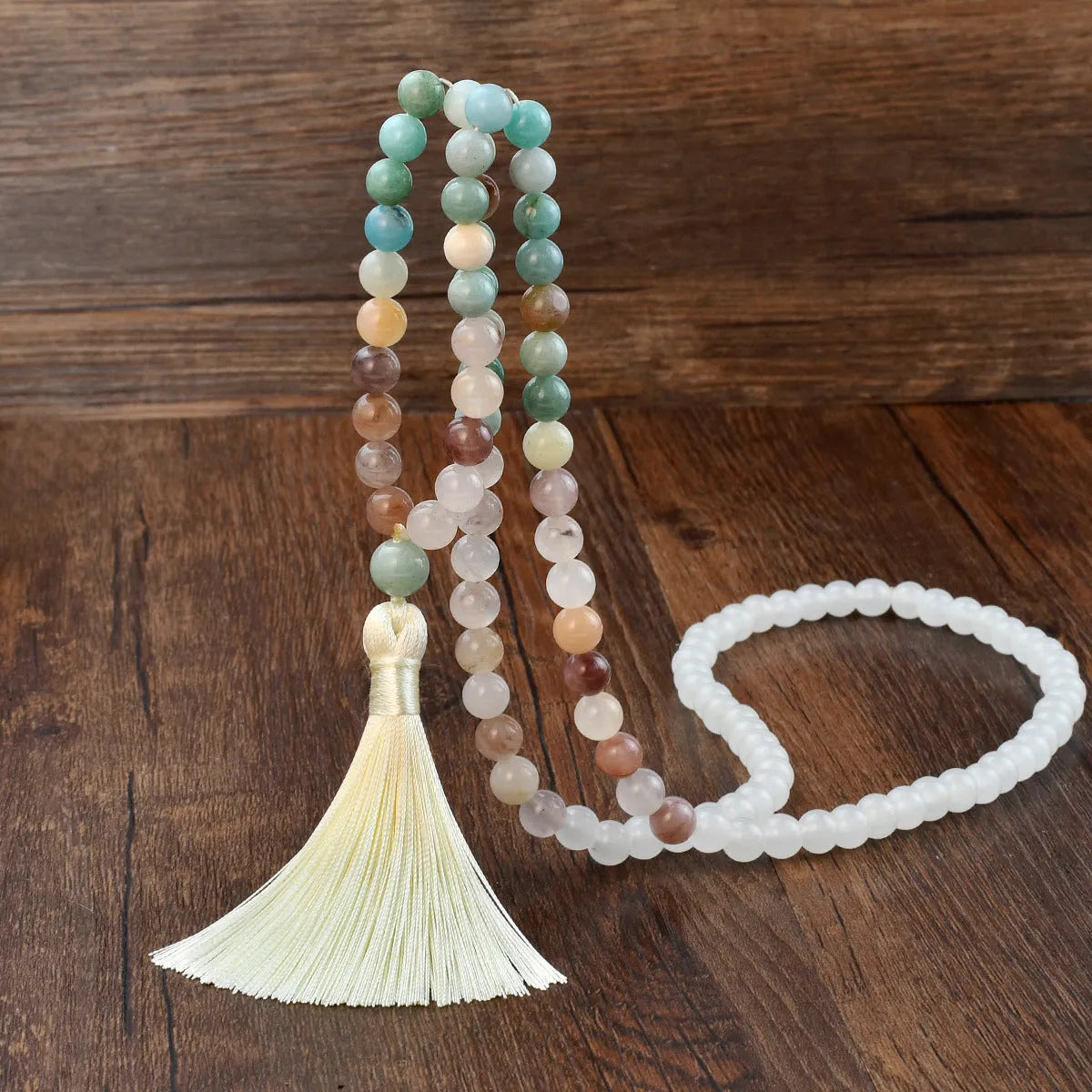 Handmade long necklace with geometric gemstone pendant and tassel on a ball bead chain