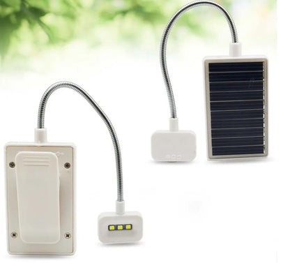 Solar-powered LED garden light with plastic lampshade and button switch for outdoor illumination