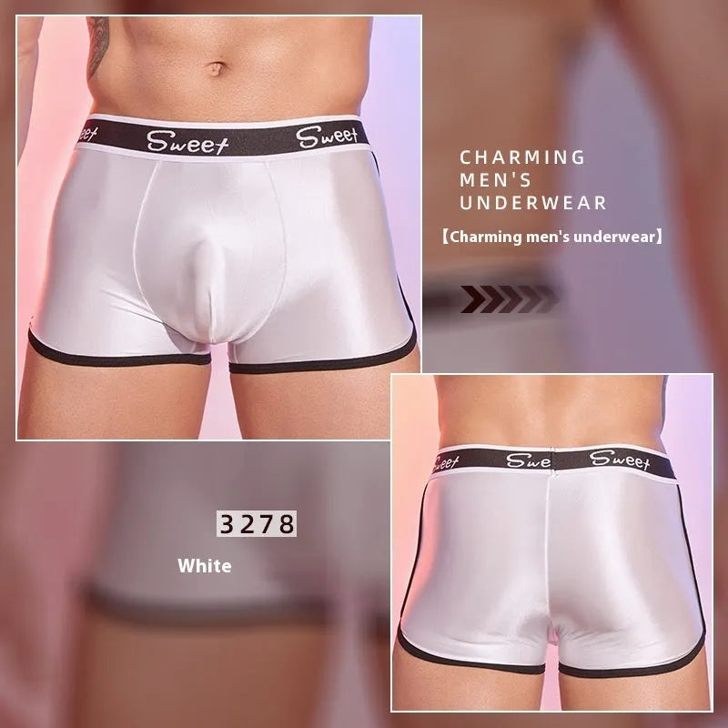 Men's shiny silky nylon boxer briefs in black, white, and sapphire blue colours.