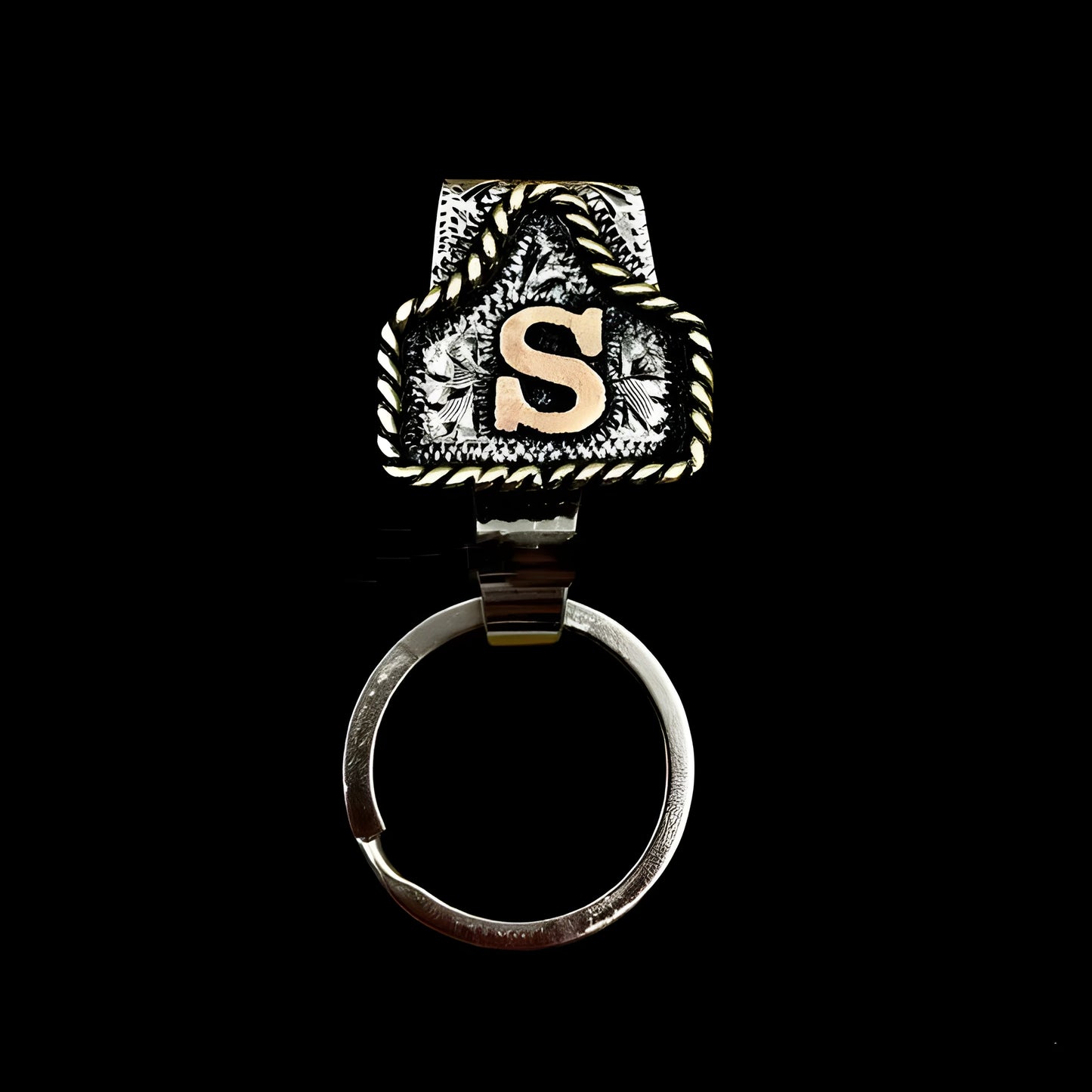 Handmade cow tag design metal keychain on a keyring, shown in one of many available colours.