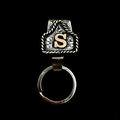Handmade cow tag design metal keychain on a keyring, shown in one of many available colours.