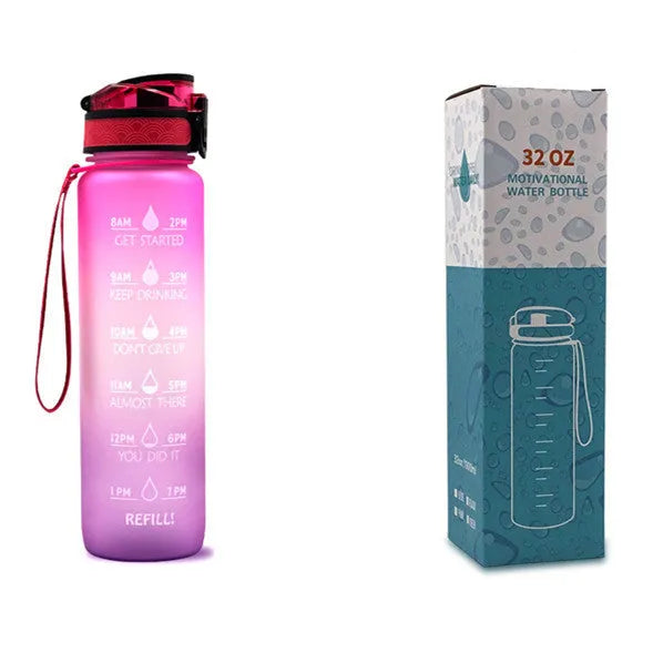 Blue and red gradient 1 litre Tritan sports water bottle with time markers and a flip-top lid.