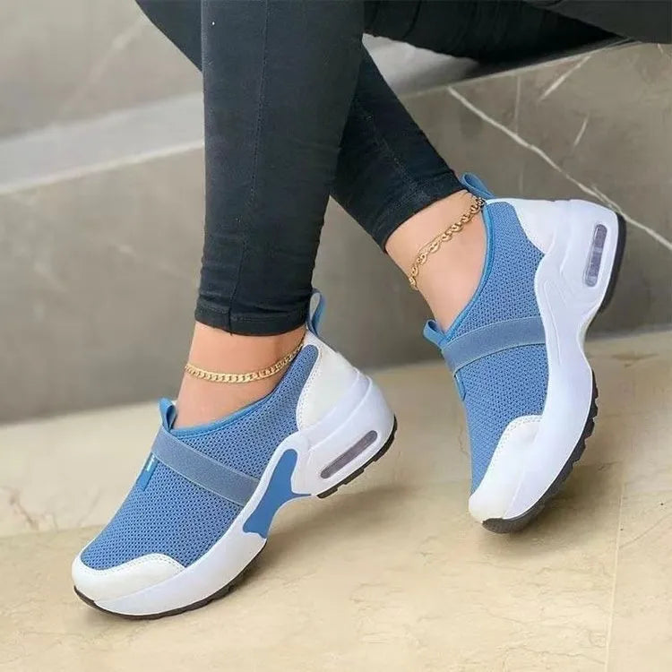 Women's lightweight flat sneakers in mesh with a rubber sole, shown in multiple colours.