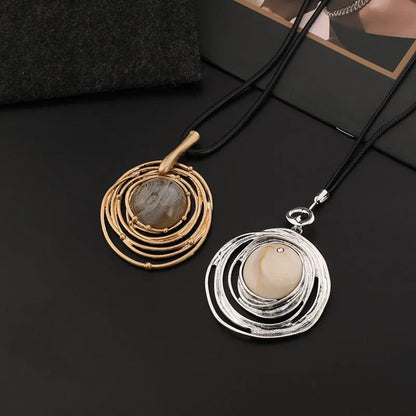Gold geometric plaid pendant necklace on snakeskin wax rope chain with adjustable length