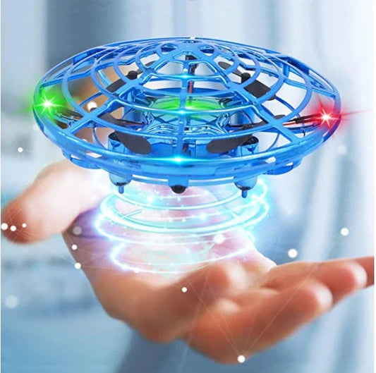 Futuristic mini drone helicopter with UFO-inspired design, automatic obstacle detection, and intuitive controls