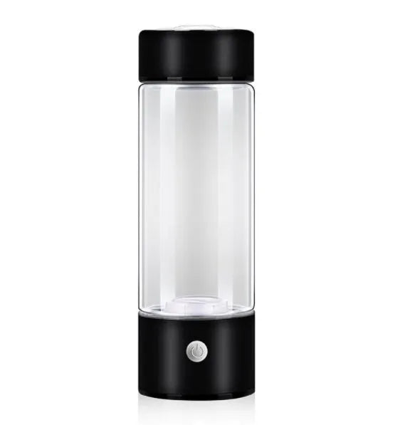 Portable hydrogen water bottle with glass chamber and stainless steel components showing electrolysis bubbles
