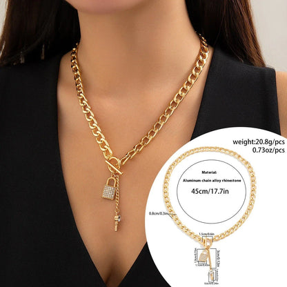 Elegant chain necklace and bracelet set with shiny lock and key pendant, fashionable ladies accessories