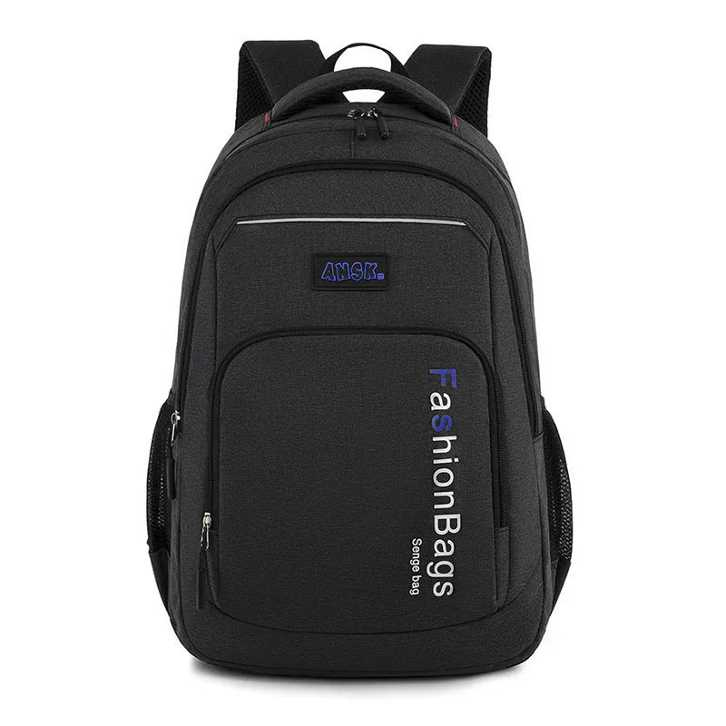 Large black nylon fashion backpack with dual straps, showing organised internal laptop and file pockets