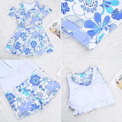 Women's fresh floral blue one-piece swimsuit dress showing front view