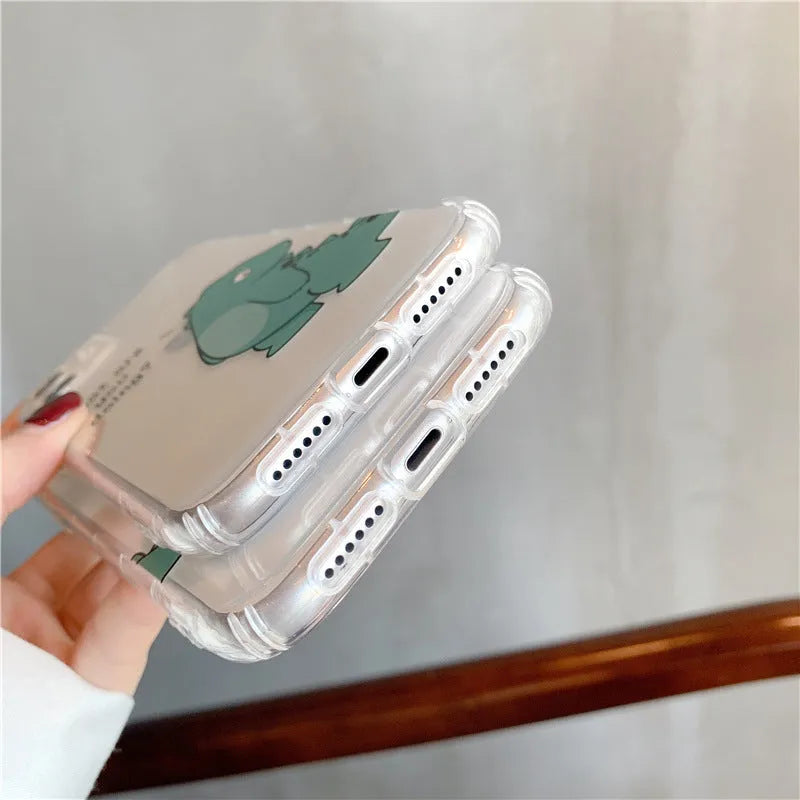 Transparent silicone and TPU iPhone case with airbag protection featuring a cute green dinosaur design.