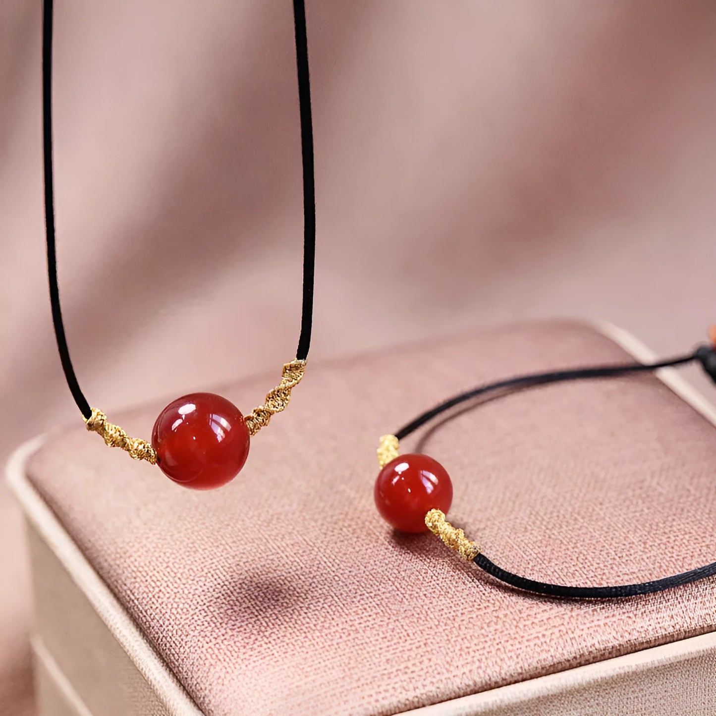 Hand-woven red agate bracelet and necklace set for women in national style with bead design.
