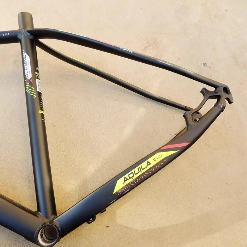 29-inch aluminium mountain bike frame in black green with disc brake mount and inner cable routing