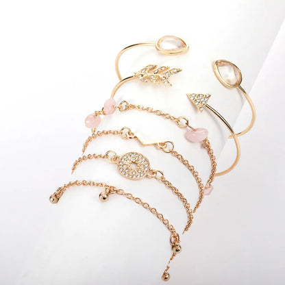 Six golden spot drill bracelets with arrow, water drop and V-shaped pendants on zinc alloy chains
