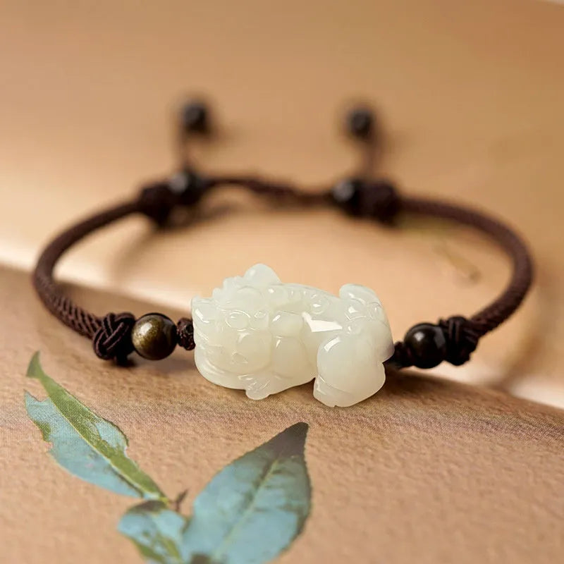 Hetian jade bracelet with black and red adjustable ropes in traditional Chinese design
