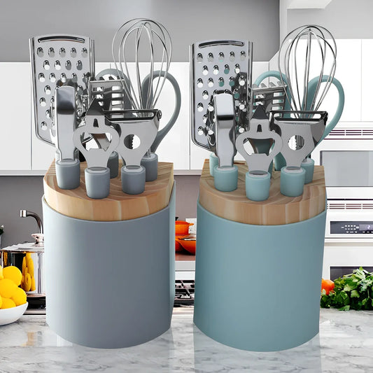 6-piece grey stainless steel kitchen utensil set with whisk, peeler, scissors on white background, essential for quick prep