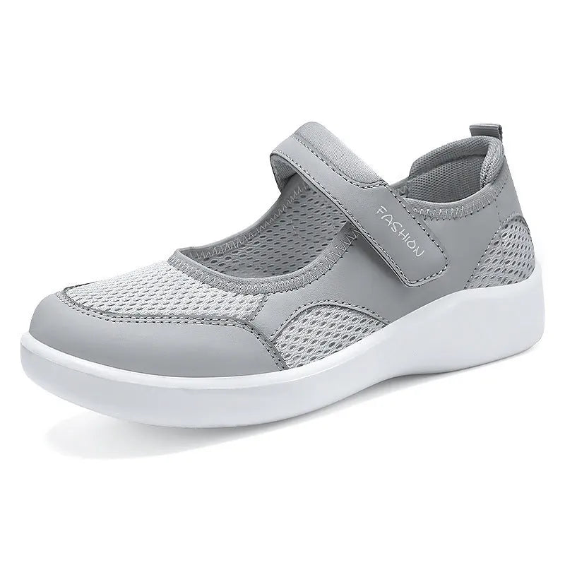 Women's breathable mesh casual shoes in black with Velcro closure and round toe design
