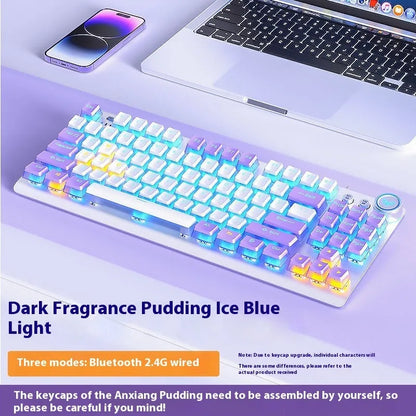 Tarantula tenkeyless wireless mechanical keyboard with side-engraved keycaps on a metal frame, showing ice blue backlighting.