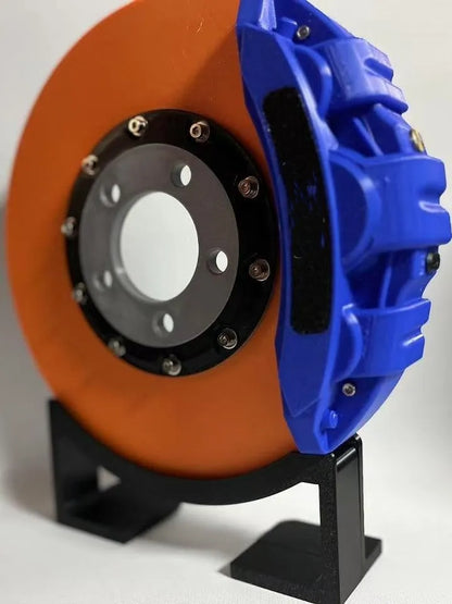 Brake disc design LED night light with caliper details in blue, red, or yellow colour options on desktop