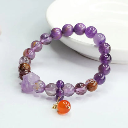 Nine purple crystal bracelet with Amethyst beads and red agate stones in Mori style design
