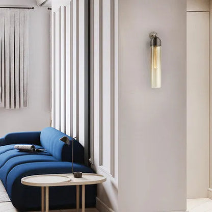 Nordic postmodern creative glass wall lamp in modern minimalist style on a living room wall.