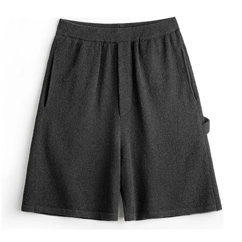 Cement grey men's loose-fit straight-leg polyester sports shorts on a mannequin