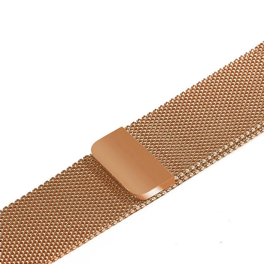 Stainless steel Apple Watch strap in silver on a wrist, showing the metal links and secure clasp.