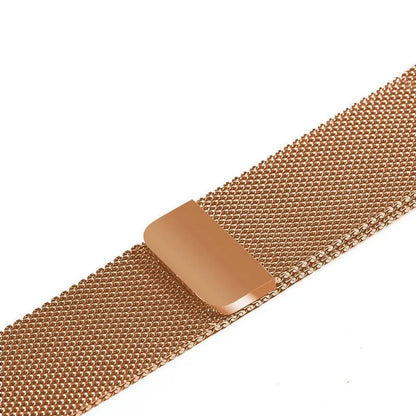 Stainless steel Apple Watch strap in silver on a wrist, showing the metal links and secure clasp.