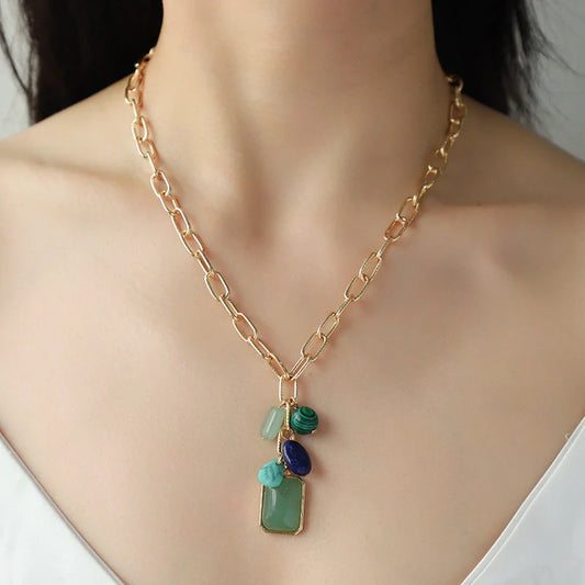Elegant pendant necklace with a modern geometric design in vibrant colours, perfect for the discerning British woman.