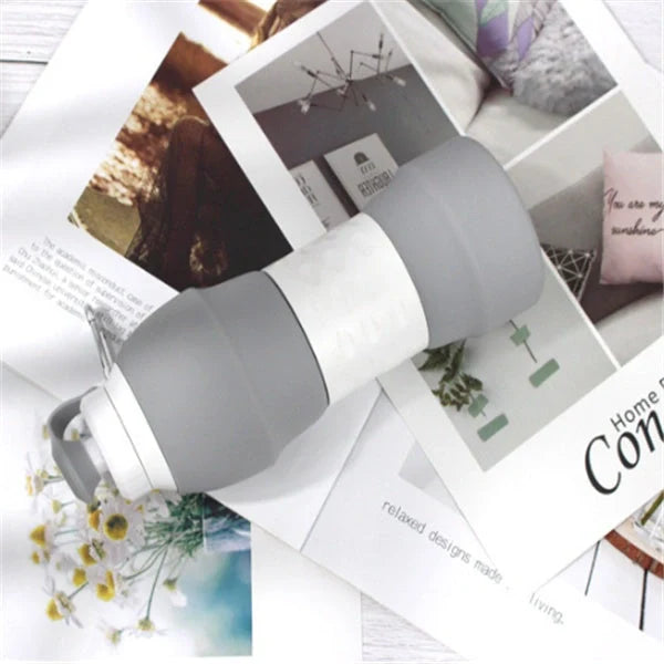 Collapsible silicone water bottle in various colours, perfect for travel and outdoor activities