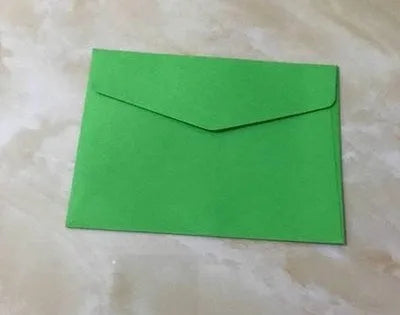 Mini coloured paper envelopes in various hues measuring 11.5 by 8 centimetres