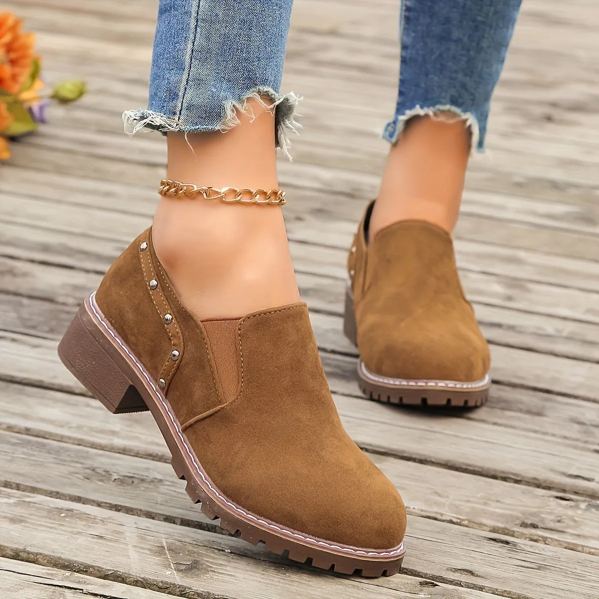 Light brown plus size women's suede ankle boot with low thick heel and elastic band detail.