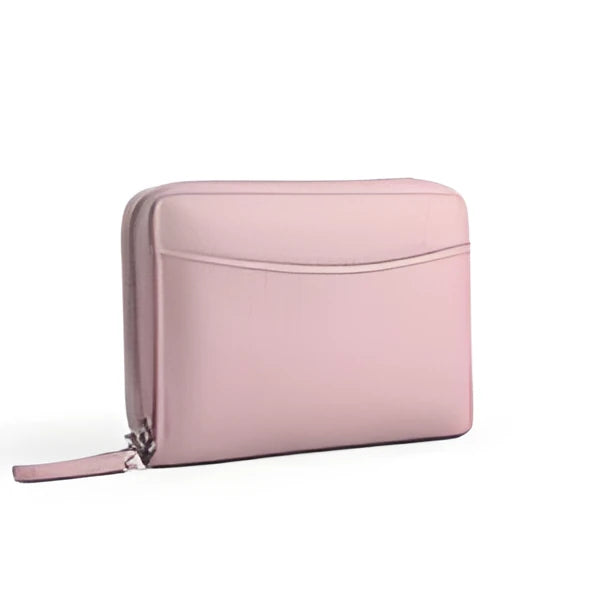 Genuine leather zipper coin purse in a solid colour showing sewing line detail.