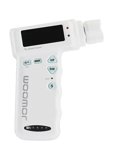 Black and white smart guitar tuner with LCD display and built-in string winder, 11cm width
