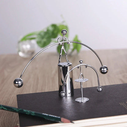 Elegant Balance Iron Man Tumbler with Captivating Swinging Motion and Stainless Steel Construction