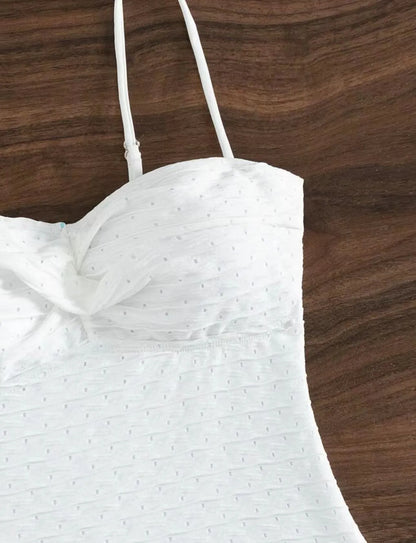 White one-piece swimsuit for women with sling design made from quick-drying polyester fabric