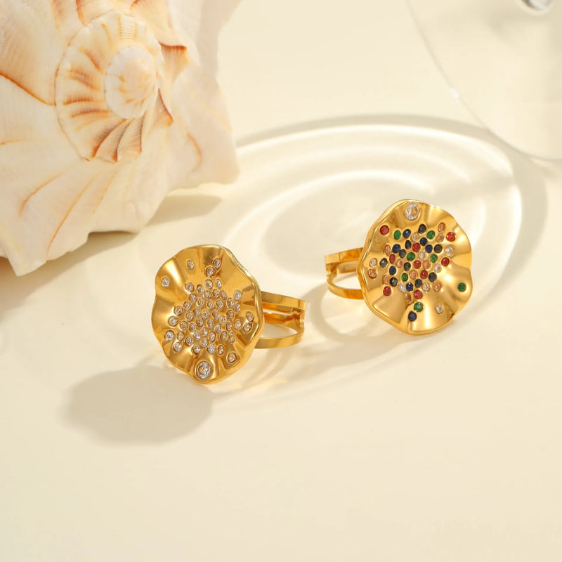 Pleated inlaid colour diamond titanium steel ring featuring geometric open-mouth styling with a free-size fit, crafted in electroplated stainless steel for an affordable luxury aesthetic. Available in colourful crystals or white diamond finishes.