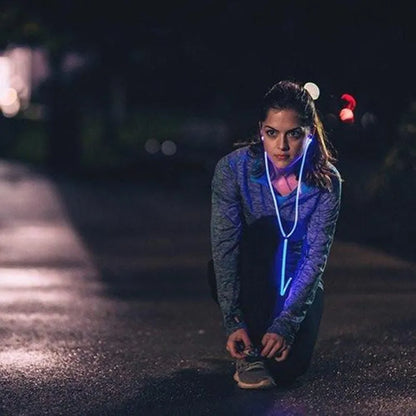 Magic Light LED Earphones in blue, green, or pink with aluminium alloy shells and EL light lines syncing to music rhythm.