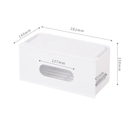 A grey and a white plastic storage box for organising a wireless router and its cables.