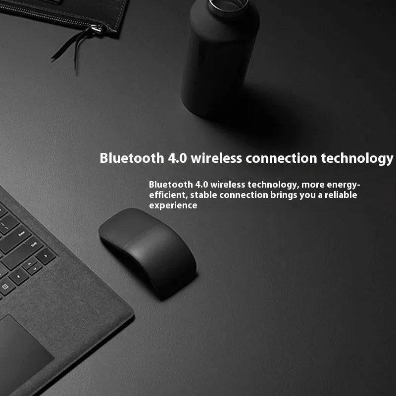 Folding wireless touch mouse showing compact design with Bluetooth connectivity