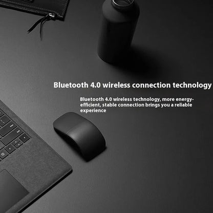 Folding wireless touch mouse showing compact design with Bluetooth connectivity