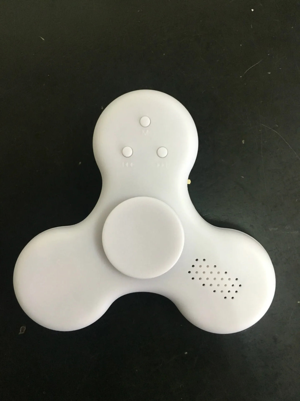 Square Bluetooth speaker music fidget spinner MP3 player in blue, showing button controls and compact design.