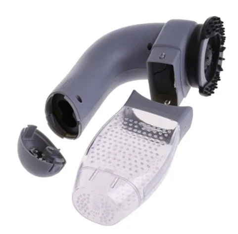 Grey handheld electric pet hair remover brush with soft rubber head for grooming dogs and cats.