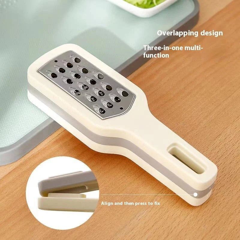 3-in-1 stainless steel cheese and vegetable grater with non-slip handle
