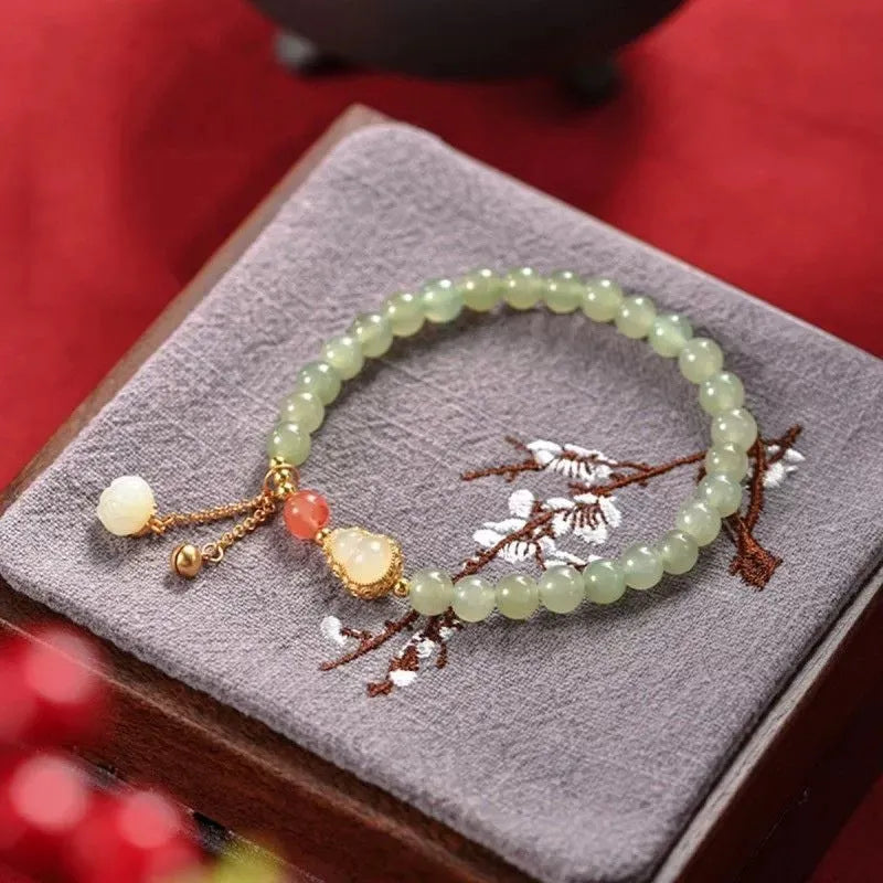 Qingshui jade women's bracelet with gold gourd charm and fu character, 6mm gold plated beads